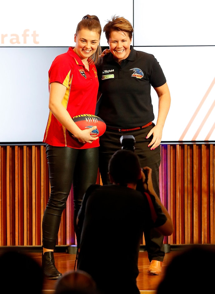 AFL 2016 Media - NAB AFLW Draft MELBOURNE, AUSTRALIA - OCTOBER 12: The number seven draft pick for the Adelaide Crows Ebony Marinoff is announced and poses with coach Bec Goddard on stage during the 2016 NAB AFLW Draft at NAB Building on October 12, 2016 in Melbourne, Australia. (Photo by Justine Walker/AFL Media)